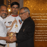 Nana Patekar receiving the Padma Shri award from President Pranab Mukherjee